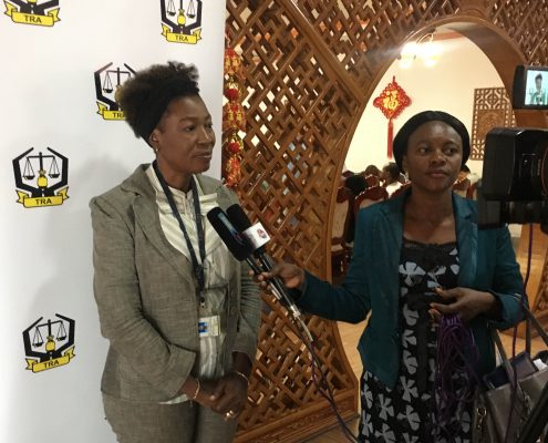 Mrs. Rose Mahendeka being interviewed by the press